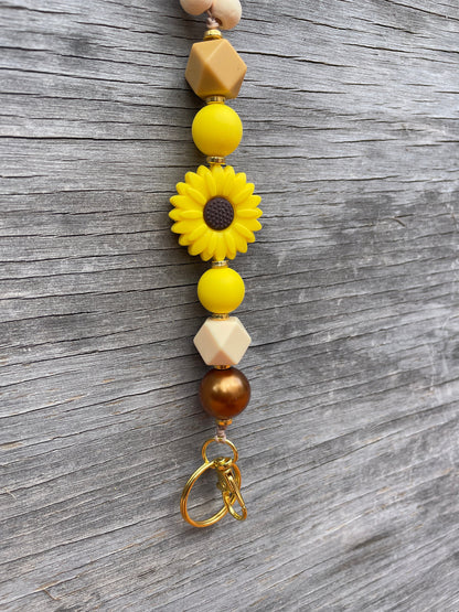 Sunflower Wooden beaded lanyard for teachers- close up of bottom of sunflower lanyard