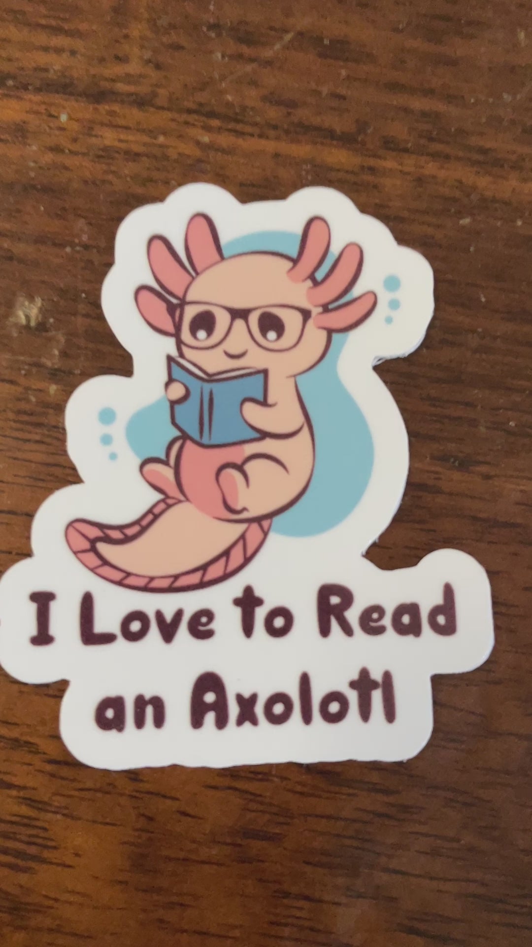 Funny teacher sticker featuring an axolotl reading- video